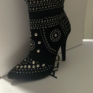 Cute aldo booties. Suede black. Trimmed with cute silver buttons.